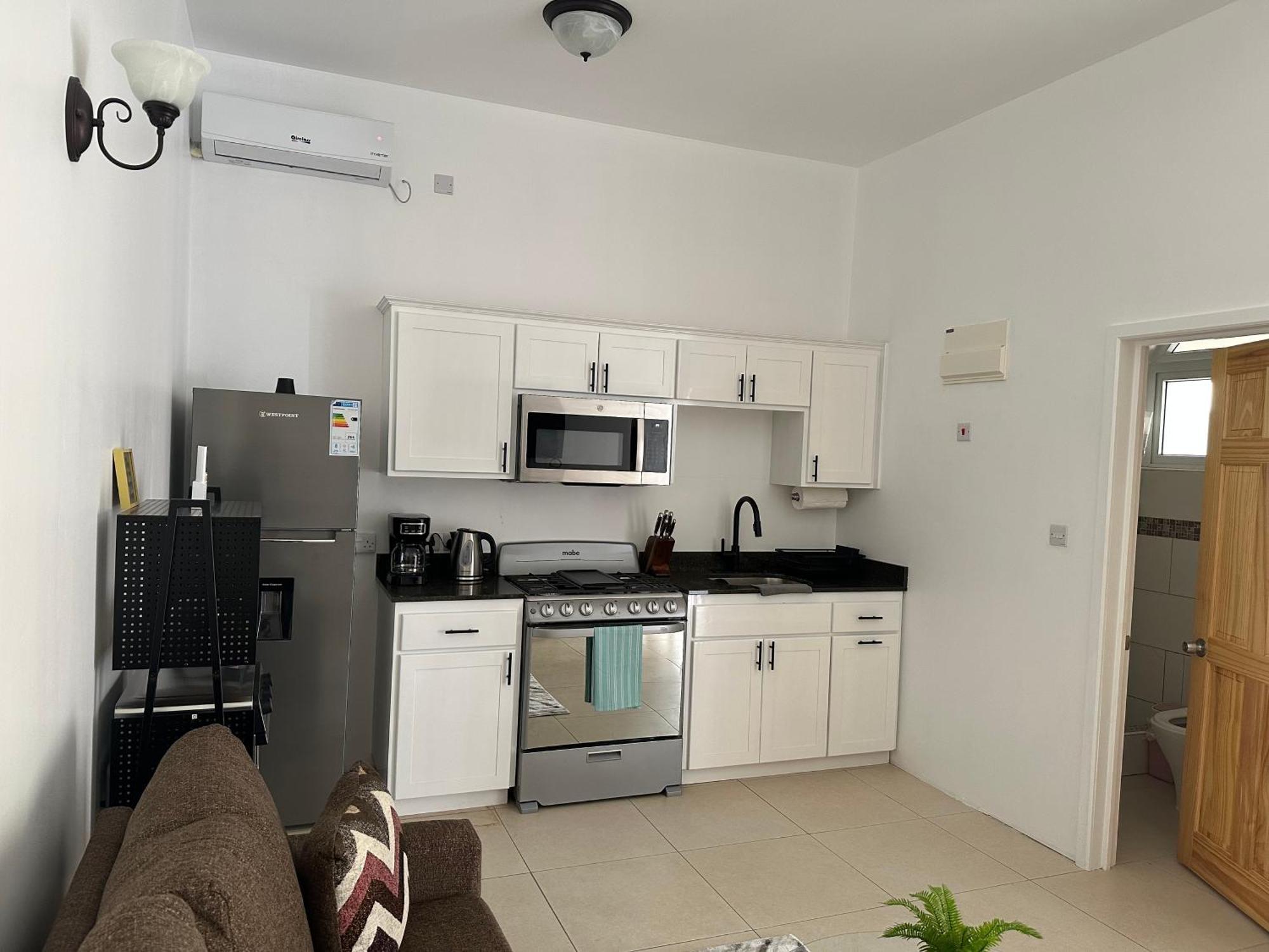 Eldorado Guesthouse & Car Rental Roseau Rum bild